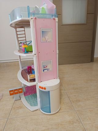 Casa de muñecas barriguitas