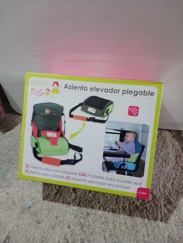 Asiento elevador plegable