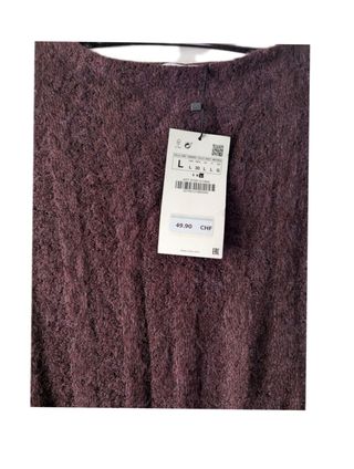 Zara. Jersey desestructurado T. L