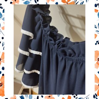 Blusa cuello de barco