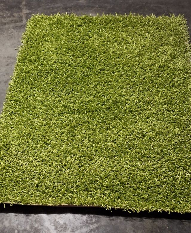 Alfombra verde 172x124cm.