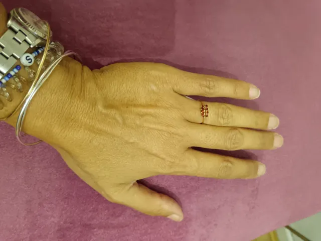 Sortija oro 18 kilates con granates