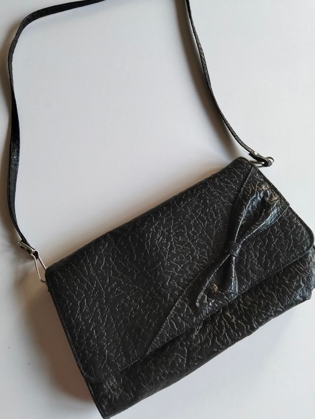 Pochette vintage nera con tracollina