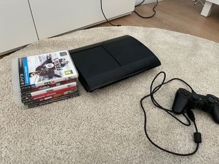 Ps3 super slim 500gb con mando  5 juego