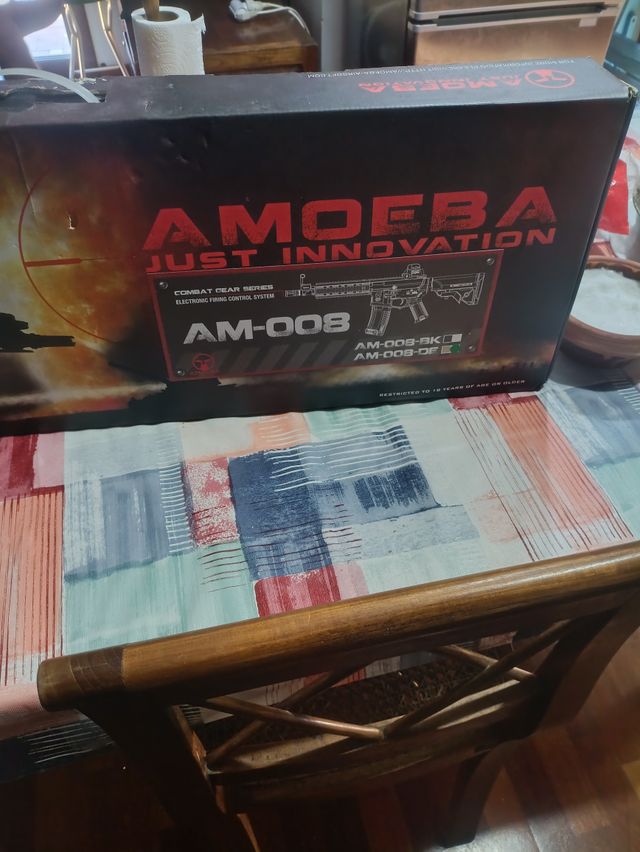 Fusil Amoeba 008 con traje incluido