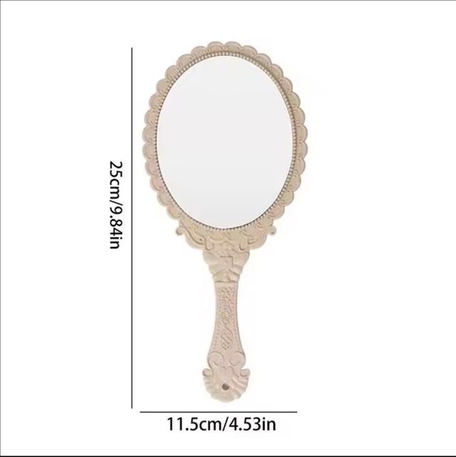 Espejo de mano plateado. Vintage.