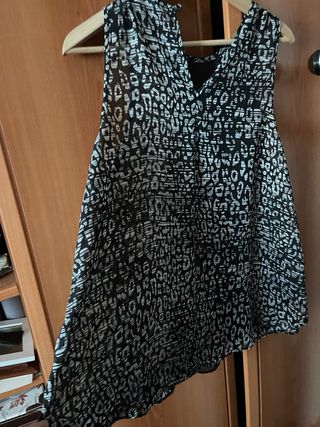 Blusa floja y bastante transparente