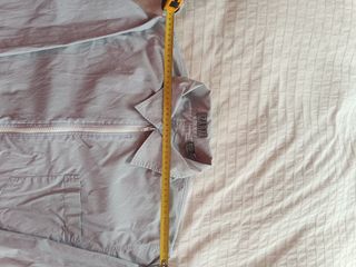 Sobrecamisa tipo impermeable