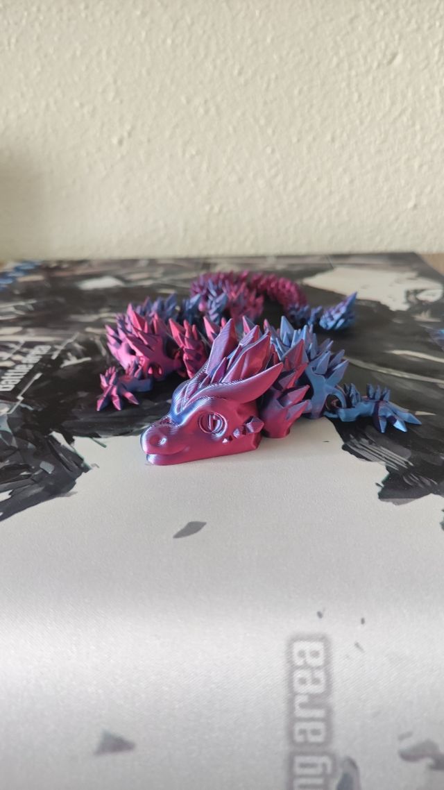 Dragón juguete brillante articulado 3D