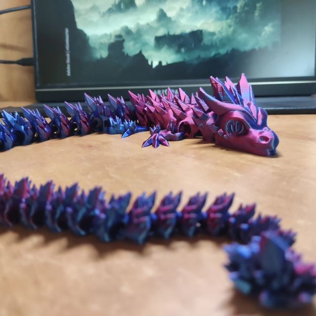 Dragón juguete brillante articulado 3D