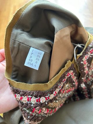 Spolverino ricamato a mano