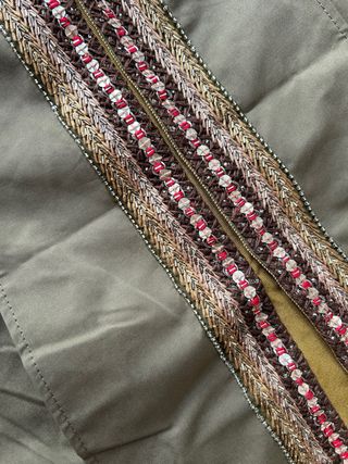 Spolverino ricamato a mano