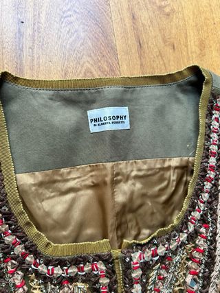 Spolverino ricamato a mano