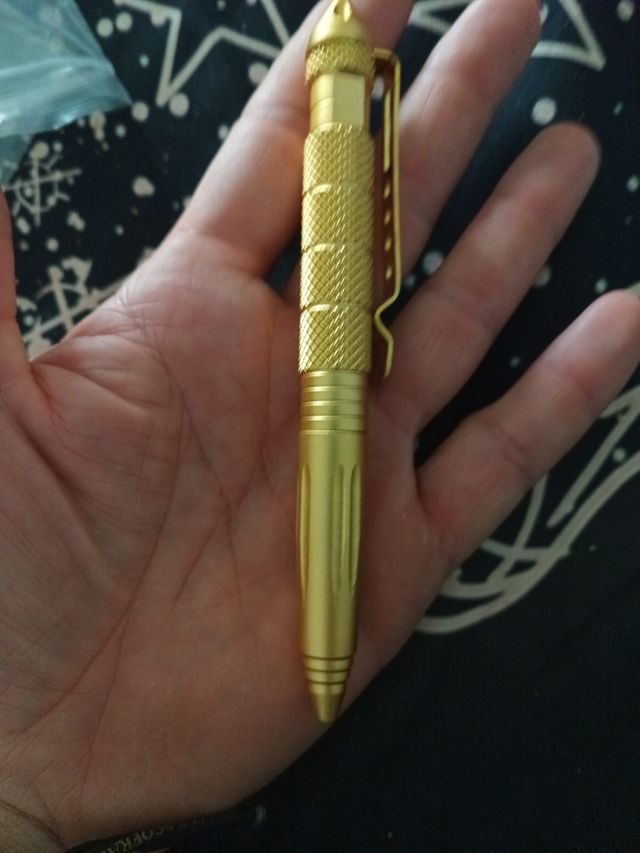 Bolígrafo táctico dorado