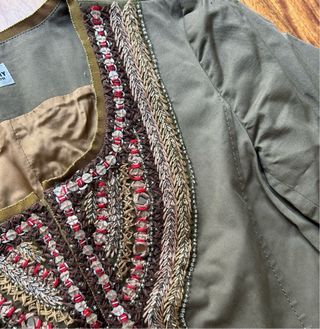 Spolverino ricamato a mano