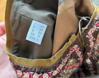 Spolverino ricamato a mano