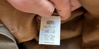 Spolverino ricamato a mano