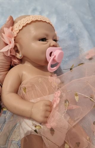 Bebe reborn silicona platino