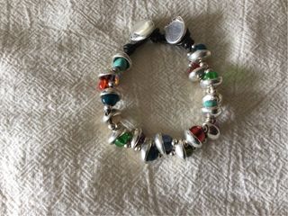 Pulsera en baño de plata marca Uno de 50