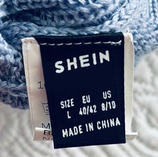 Chaleco azul de punto