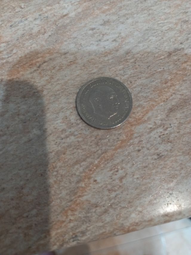 Moneda de franco troquelada estrella 74