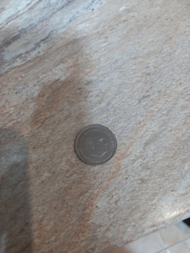 Moneda de franco troquelada estrella 74