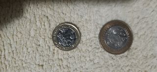 Lote de dos monedas inglesas.