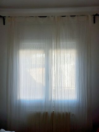 Cortinas blancas con presillas