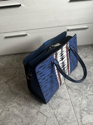 Bolso azul animal print