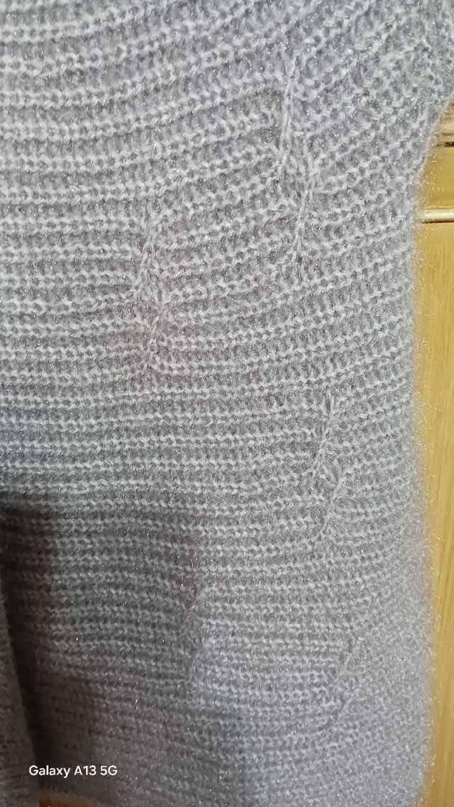 Maglione smanicato in lana pelosa