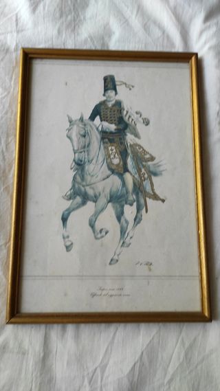 Stampa con cornice dorata