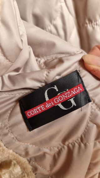 Pelliccia astrakan ecologica corta beige