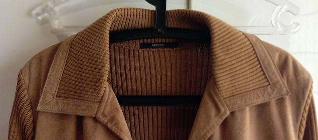 Chaqueta piel y lana Cortefiel. 