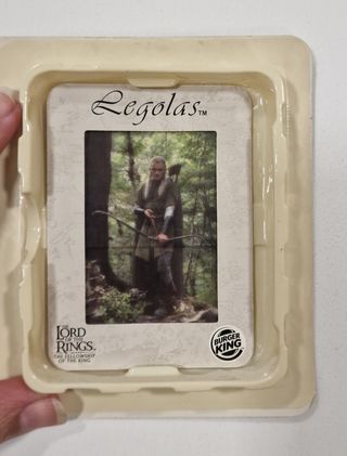 Figura Legolás y cromo transparente