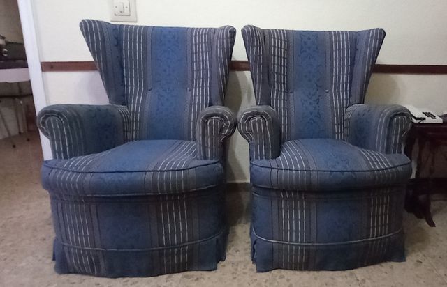 Coppia di poltrone con orecchini