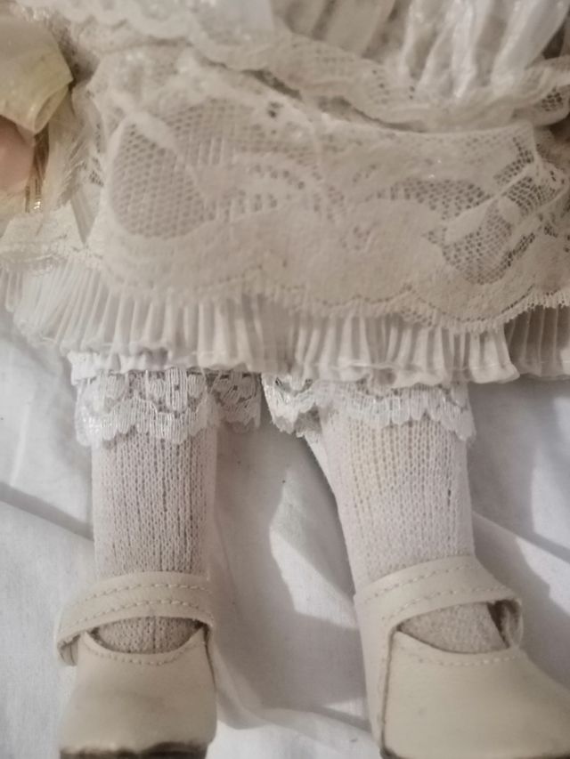 Muñeca porcelana ojos cristal 