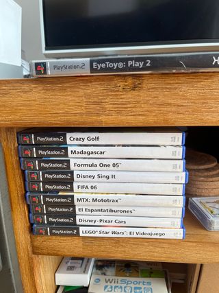 PlayStation2 Slim Silver + juego + volante + cam