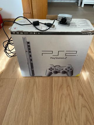PlayStation2 Slim Silver + juego + volante + cam