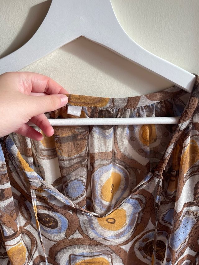 Túnica com alguma transparência