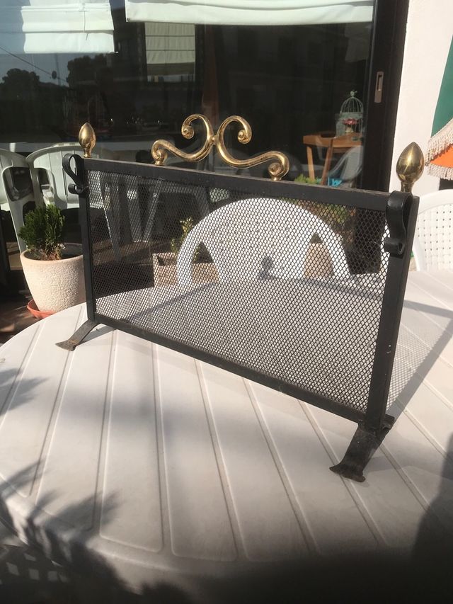 Protector de chimenea 38x64 sin contar lo dorado