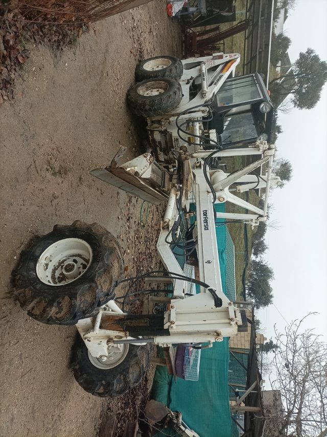 Máquina motoniveladora