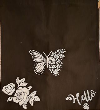 Bolsa negra de tela pintada a mano