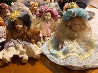 Set di 11 bamboline in ceramica