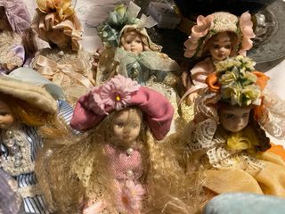 Set di 11 bamboline in ceramica