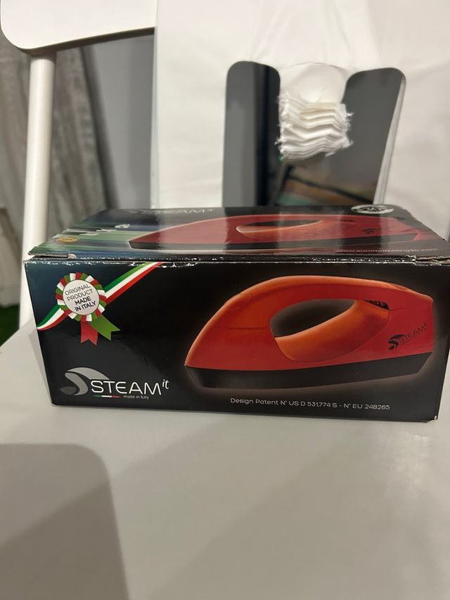 Plancha vapor vertical ropa