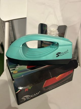 Plancha vapor vertical ropa 