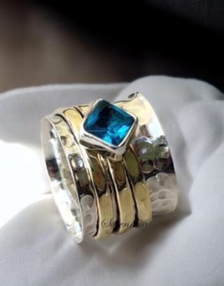Anillo 2 vueltas oro con piedra topacio