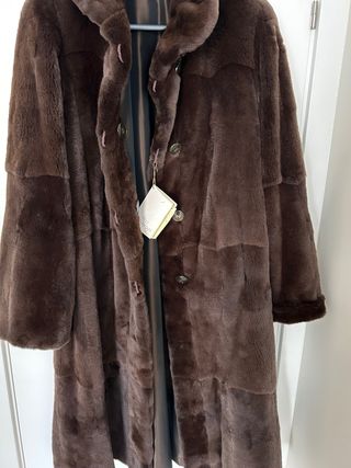 Abrigo piel.