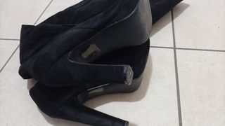 Stivali sopra il ginocchio con tacco alto