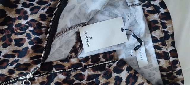 Chaleco leopardo scalpers